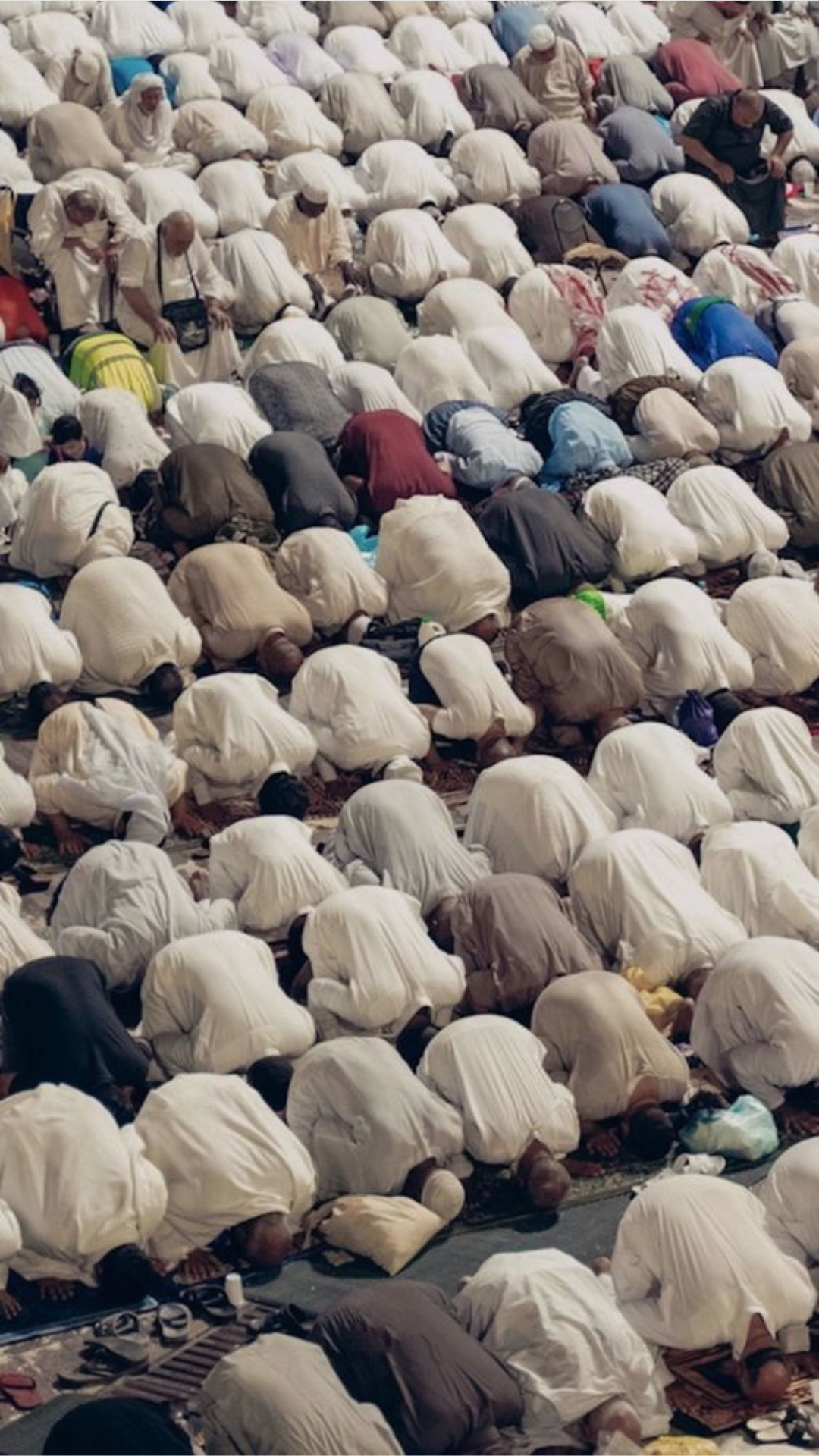 Group of muslims praying together in congregation as a group to grow spiritually, mentally, physically and as a community.